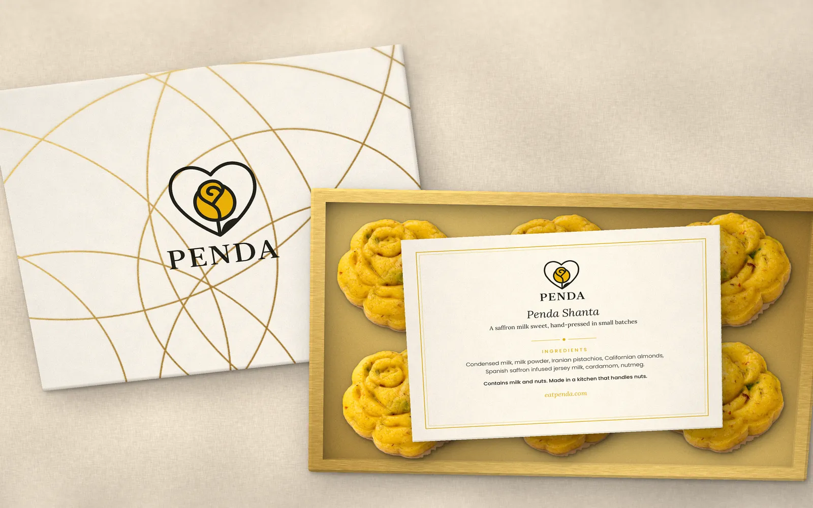 An open Penda box of six with its Penda Shanta ingredients card resting on the sweets
